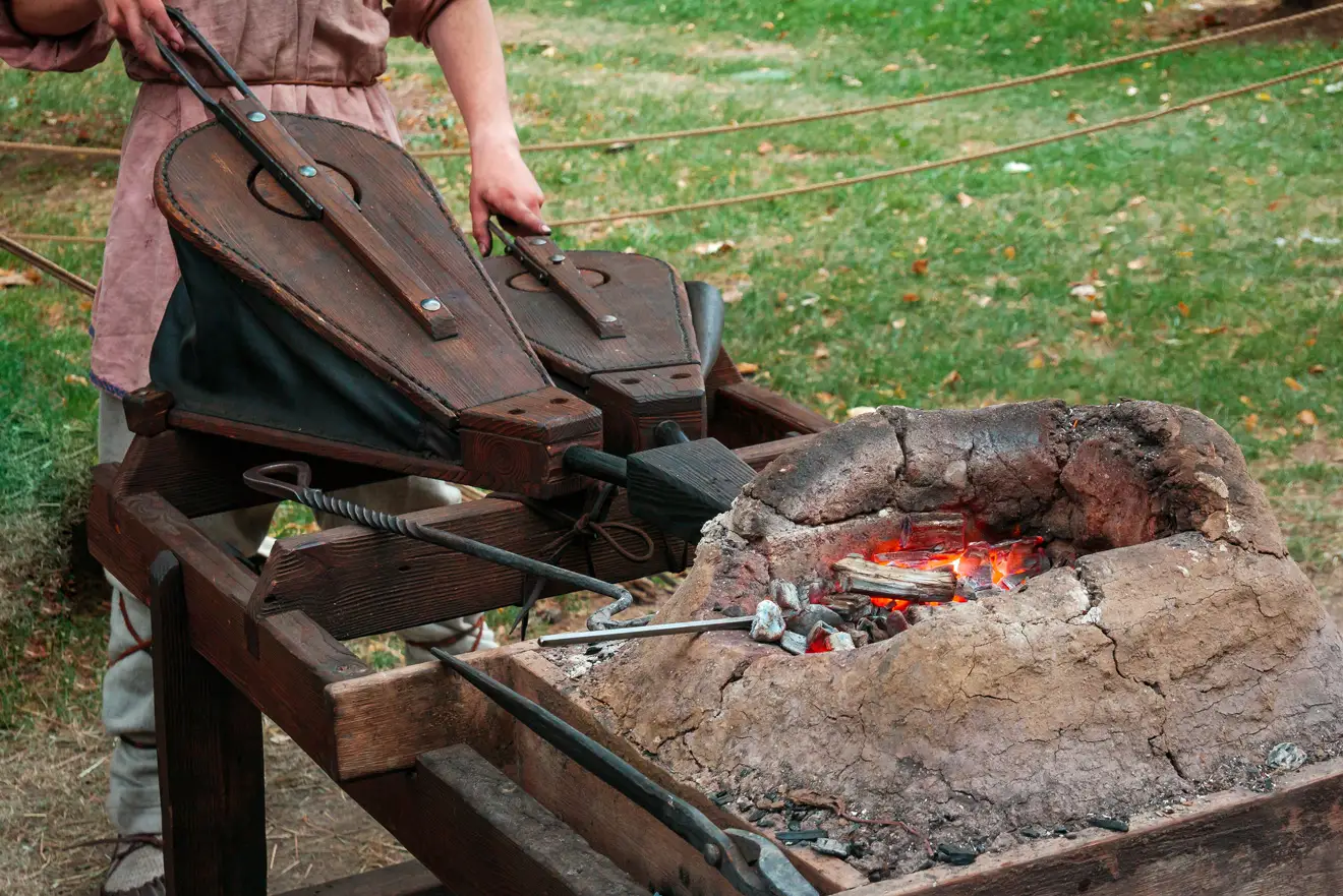 A photo of old bellows used in blacksmithing in the ancient times