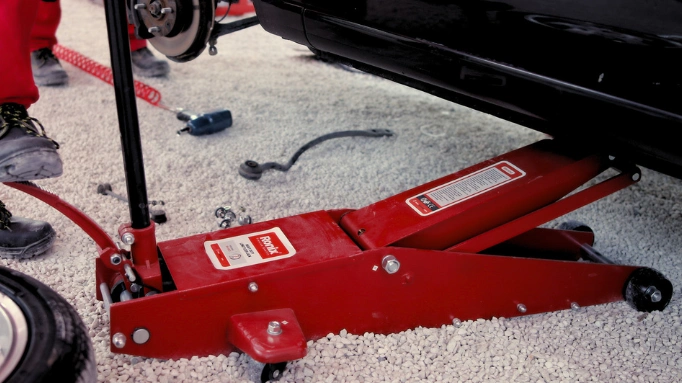 A Hydraulic Jack Used for Car Repair