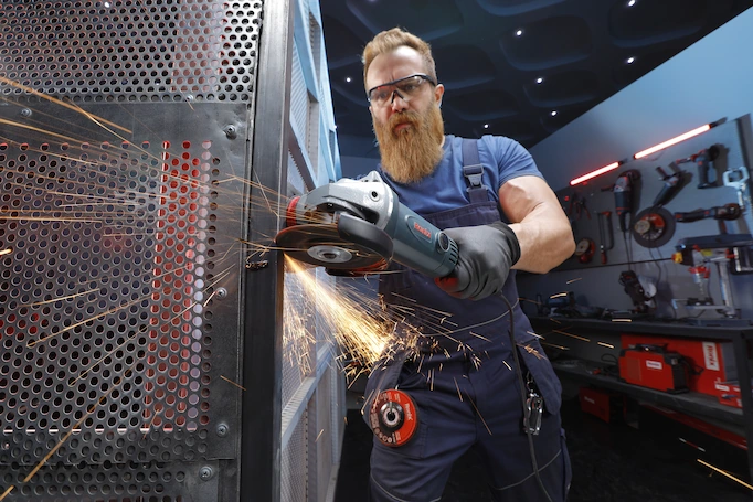 An angle grinder is being used