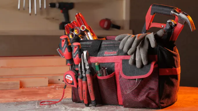 A set of various hand tools in a Ronix tool bag