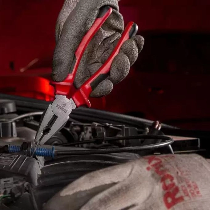picture of a hand holding a plier