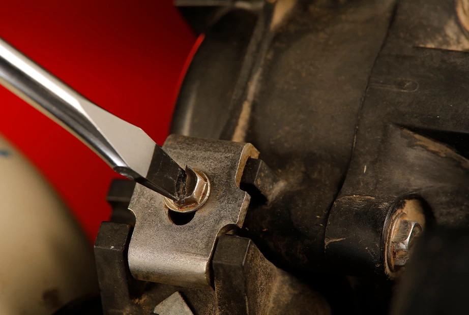 Turning a flat-head screw with a screwdriver