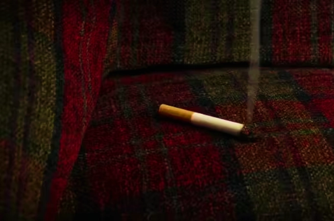 cigarette burns on a couch