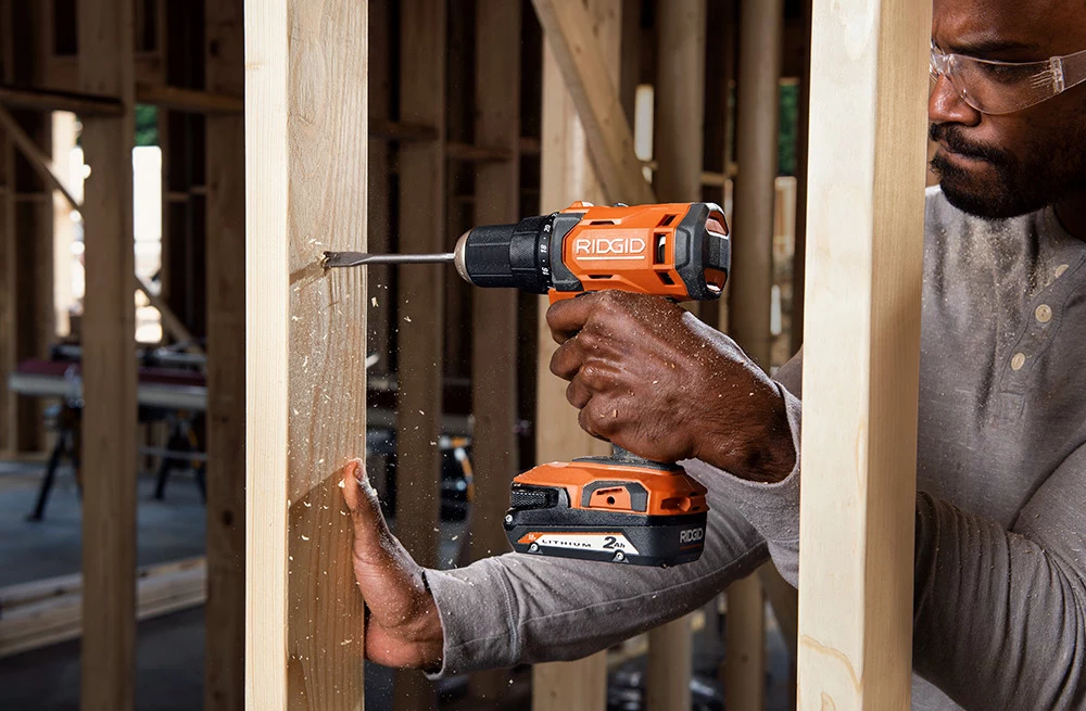 picture of a person using the best cordless power tools 