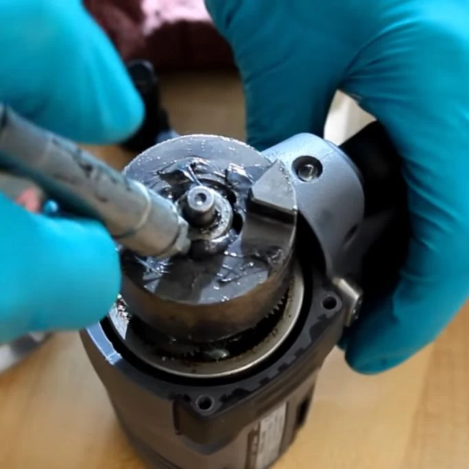 An image emphasizing the critical role of lubrication in power tool maintenance techniques. Power Tool Blade Sharpening