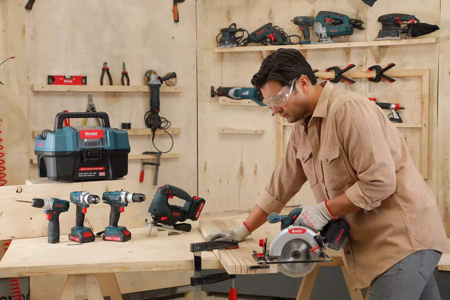 picture of a person using tools in a Wood workshop 