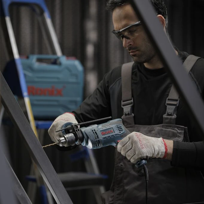 picture of a man using a power tool