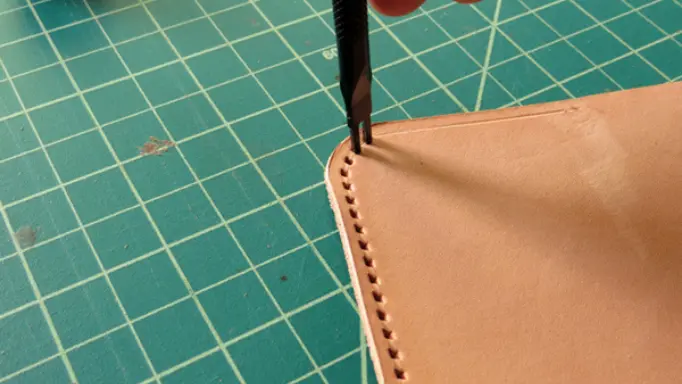 Using a diamond chisel to make holes on leather 