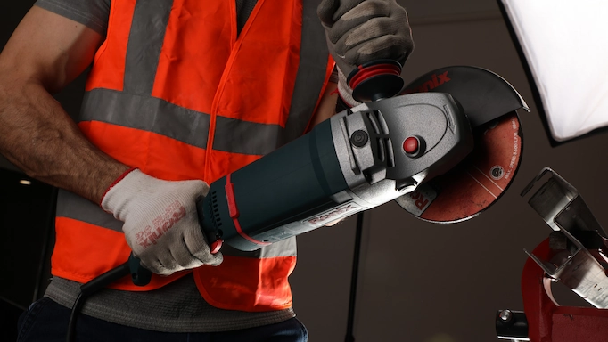 An angle grinder is being demonstrated
