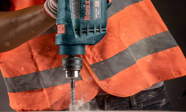 Hammer drill used to drill concrete block