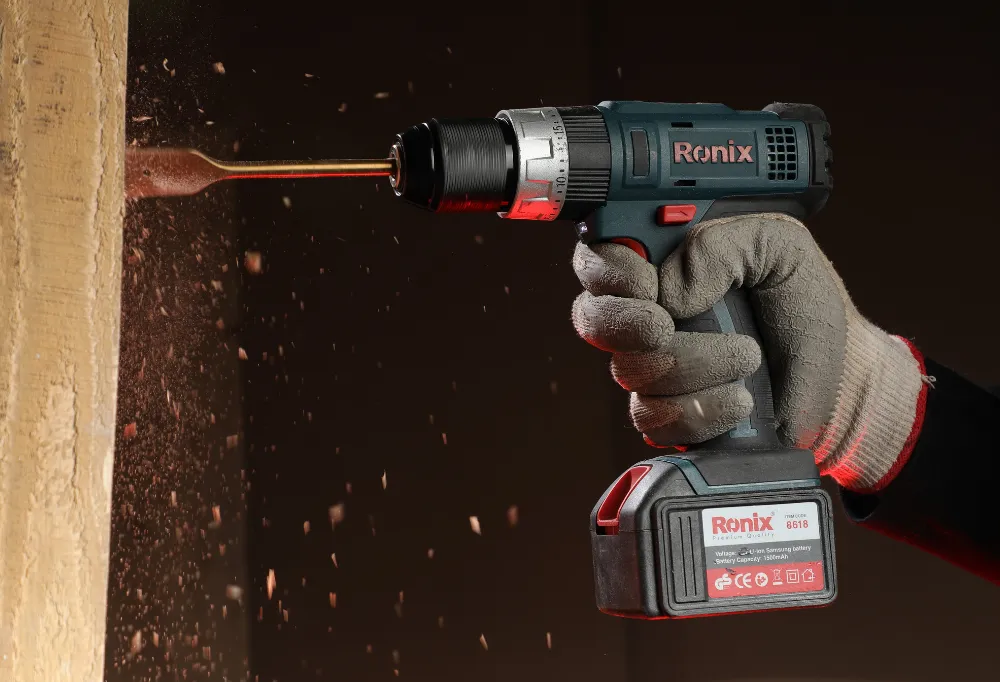 the Ronix cordless drill with a spade drill bit