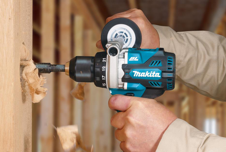 Using a Makita cordless drill to make holes into wood