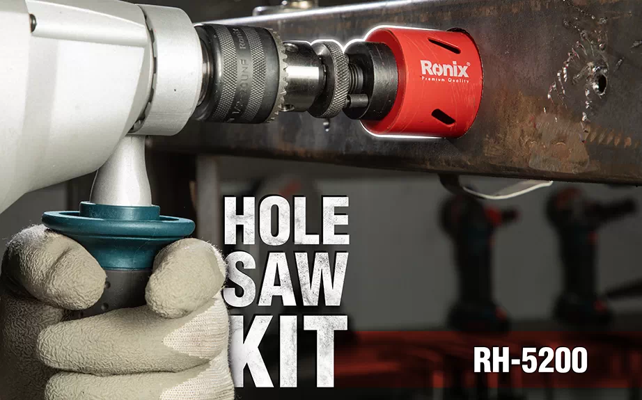A drill with a hole saw attached is used to drill a hole in a metal surface