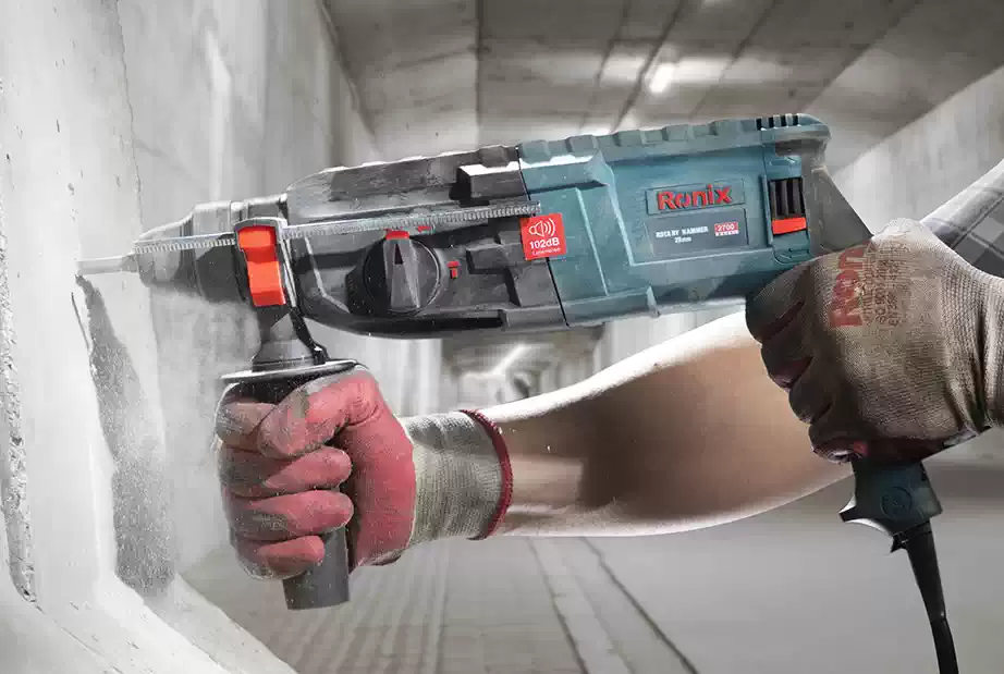 Top rotary outlet hammer drill