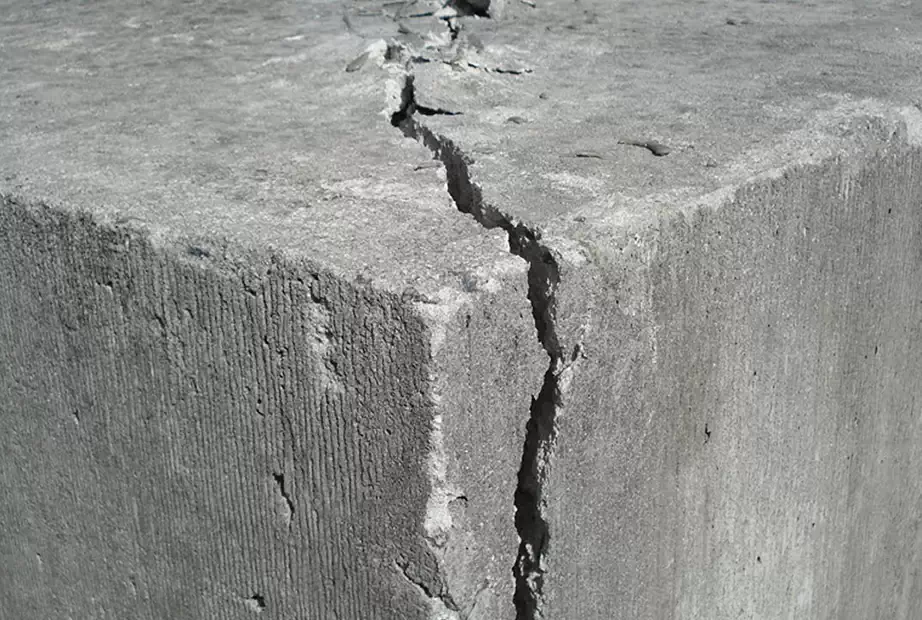 Photo of a cracked stone from its corner