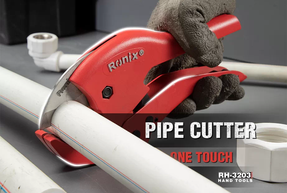 Pipe cutter being used to cut a plastic pipe