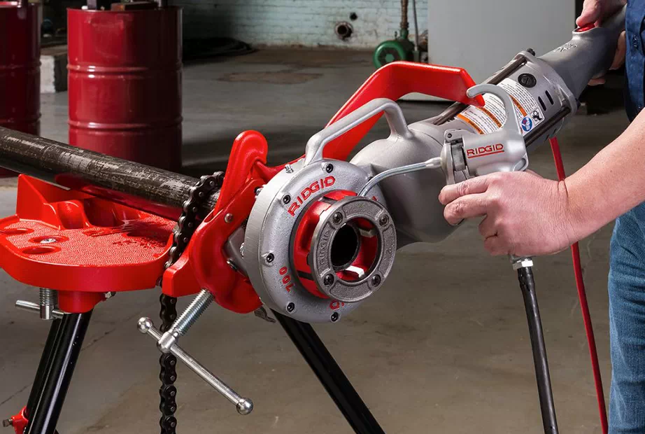 Ridgid pipe fabrication tool being used on a pipe