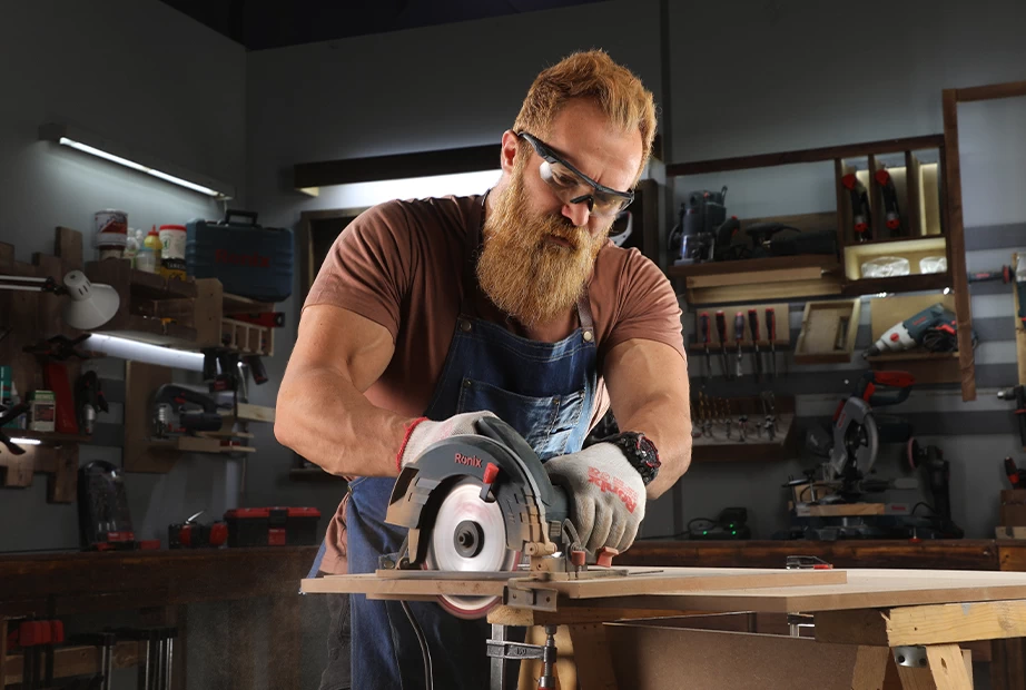  Circular saw is used on a piece of wood)