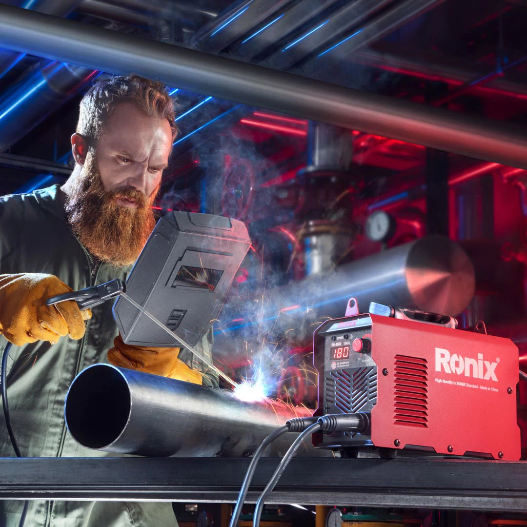 A picture of a person using the Ronix welding machine