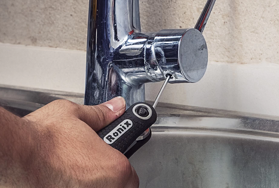 using a multi-function tool to repair faucets
