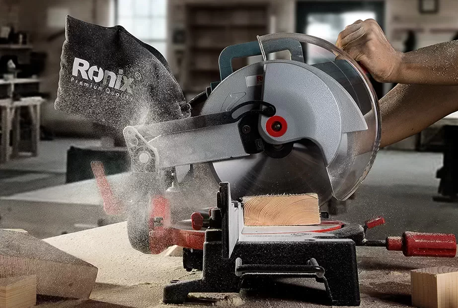 dust flying around while using a Ronix electric saw on wood