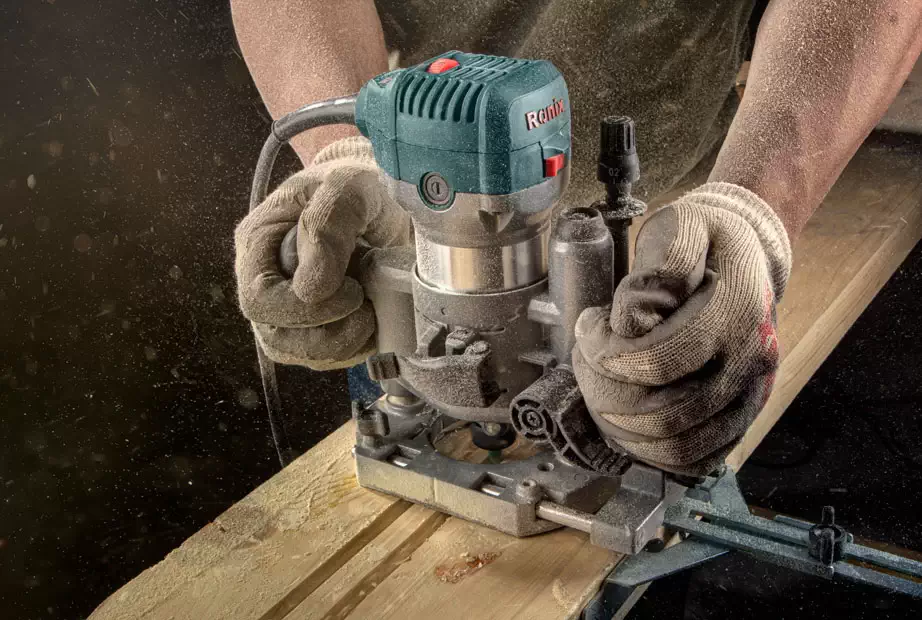 A Person working with wood Router