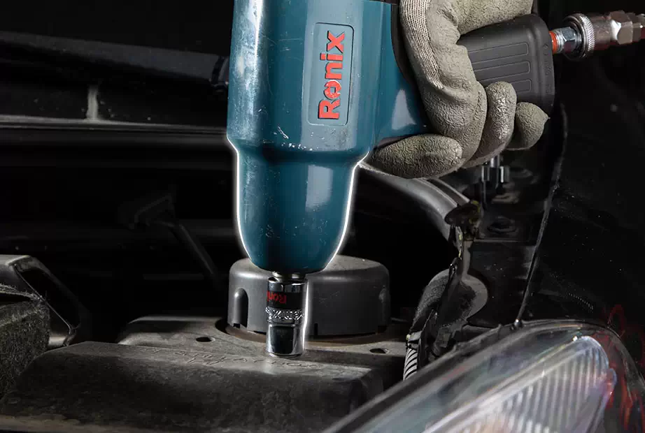 A close up of a Ronix air impact wrench with a focus on its driver