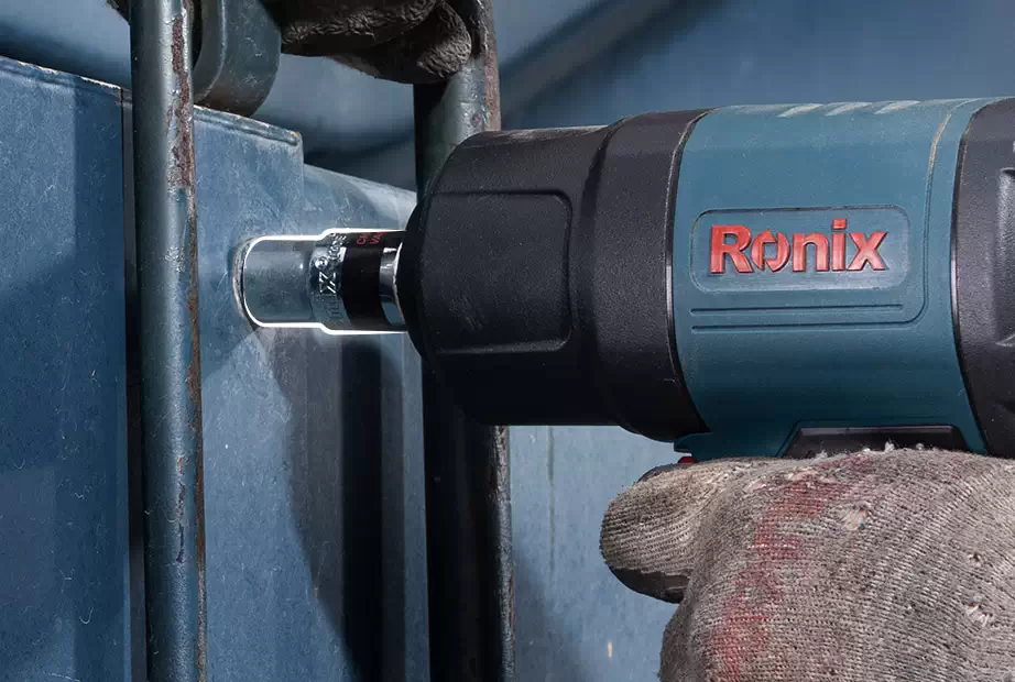 A picture of an air impact wrench with a focus on its 1/2” driver