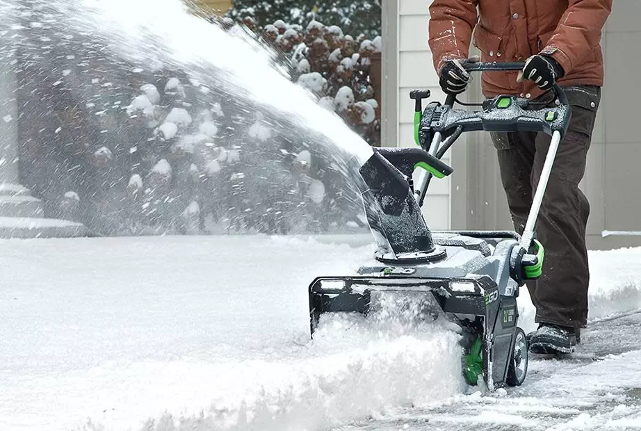 Ego snow blower is used to clear a driveway