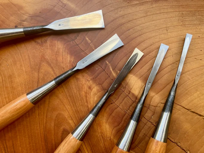 A collection of dovetail chisels