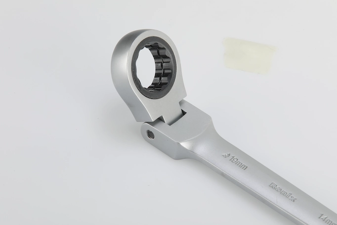 A flex-head ratcheting wrench