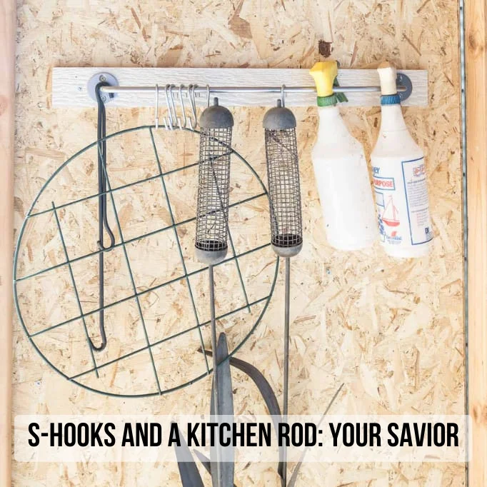 using S-hooks and a Kitchen Rod to store garden tools