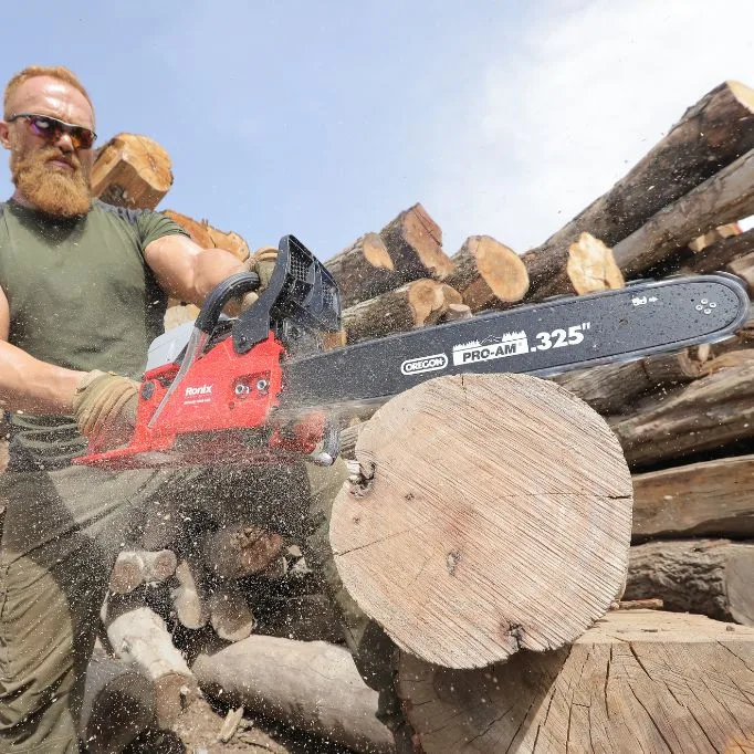 picture of a person holding a chainsaw