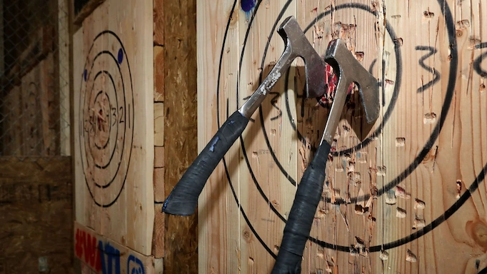  Throwing axes stuck inside the target