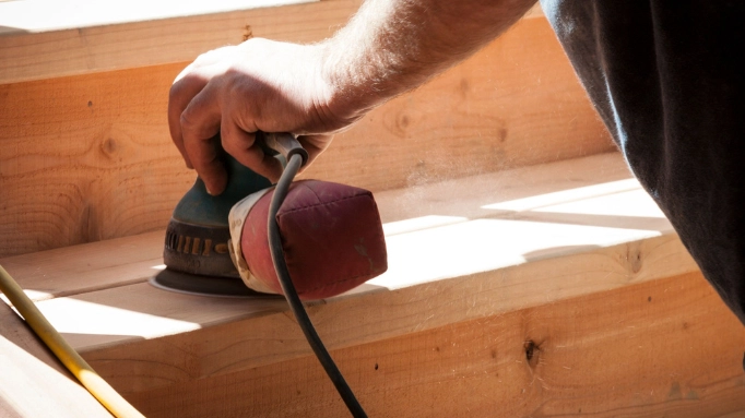 A palm sander used for stairs