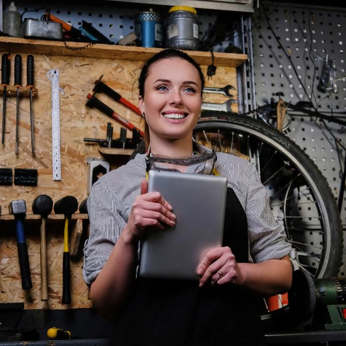picture of a girl using a hardware shop CRM software