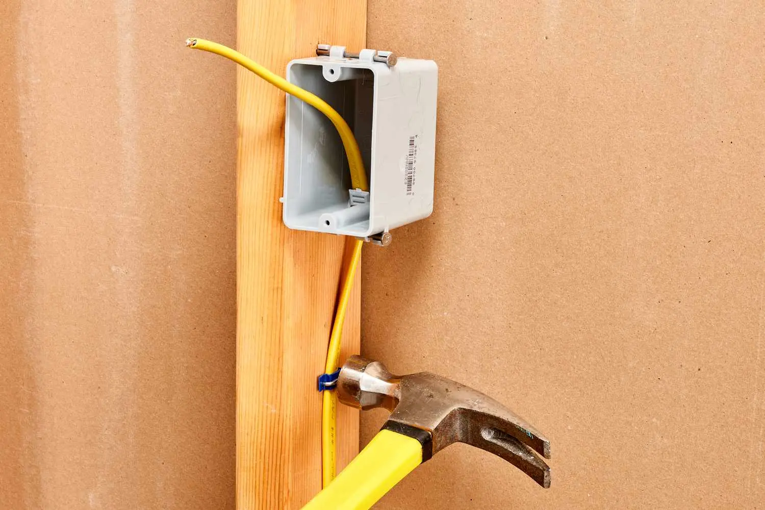 a hammer used for securing cables