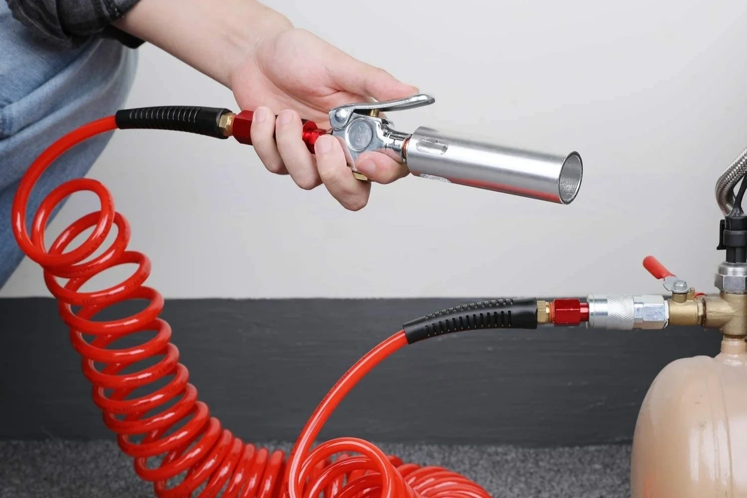 an air hose attached to an air compressor