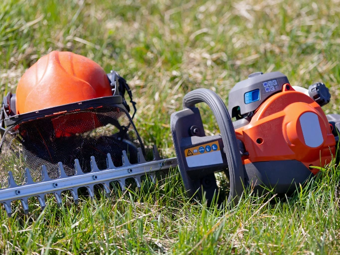 gas hedge trimmer in grass