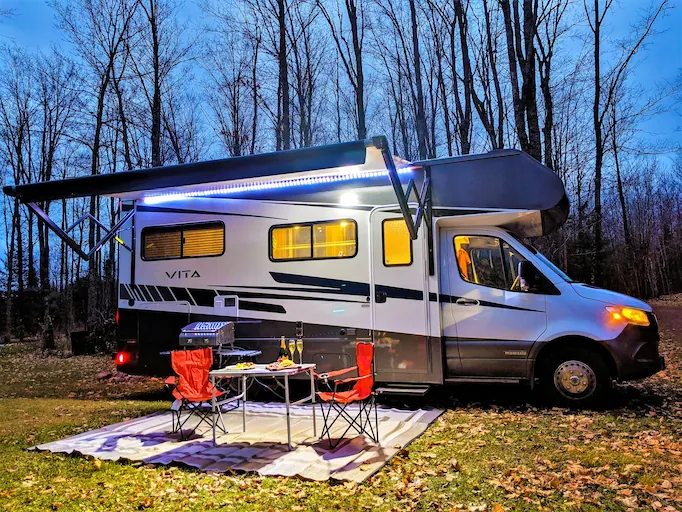 A picnic next to an RV