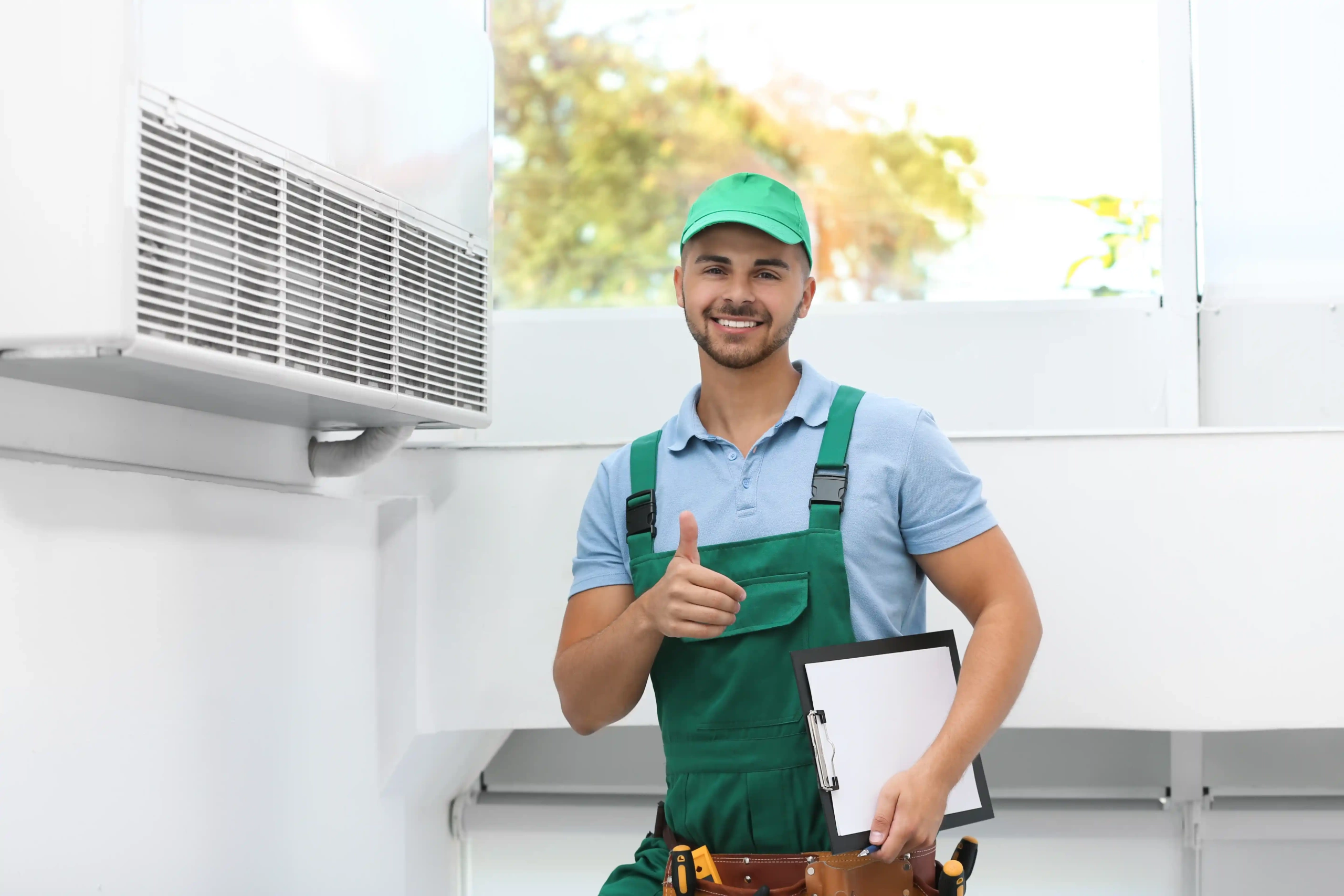 A man with an AC maintenance Checklist