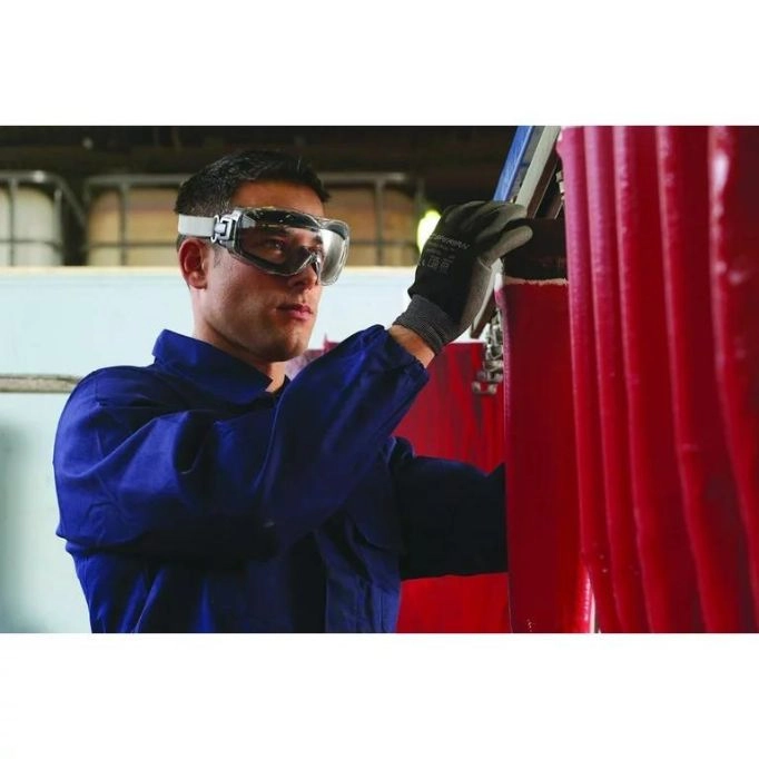 a picture of a person wearing anti-fog safety glasses during work.