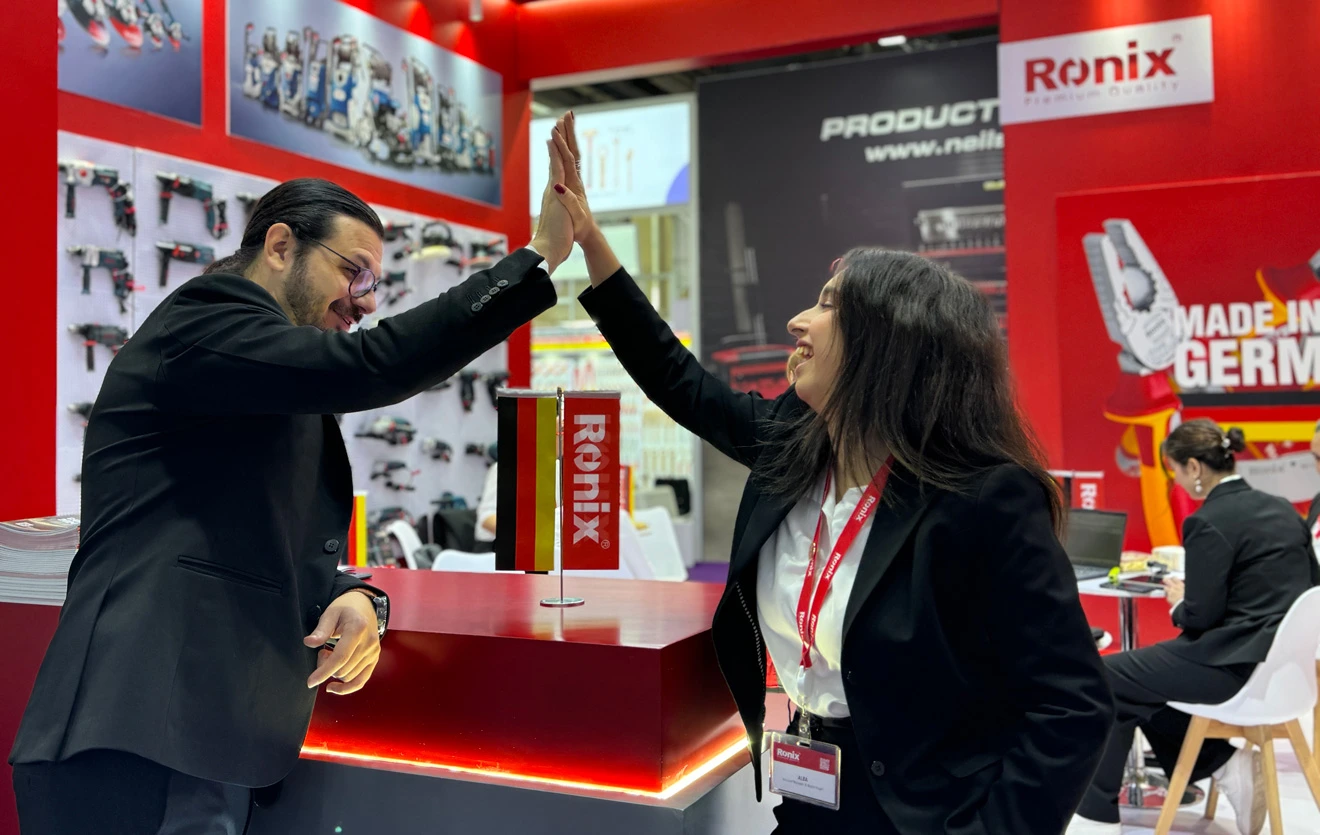 Ronix team doing high-five at the Canton Fair