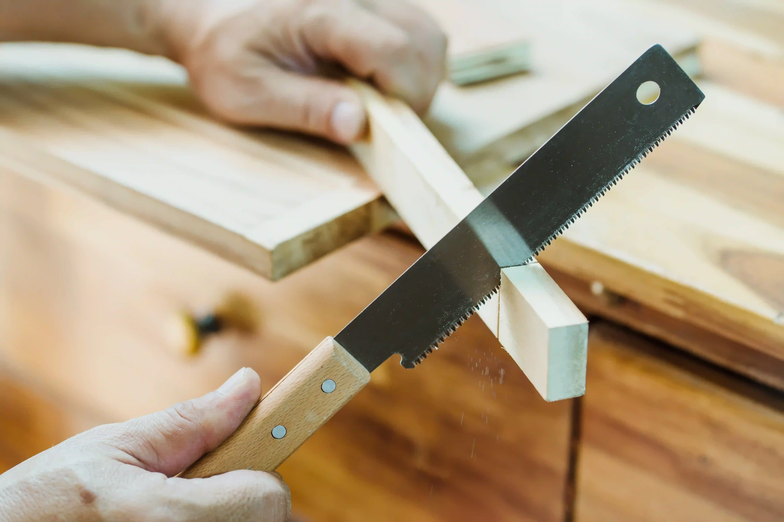 picture of a person using a Japanese saw