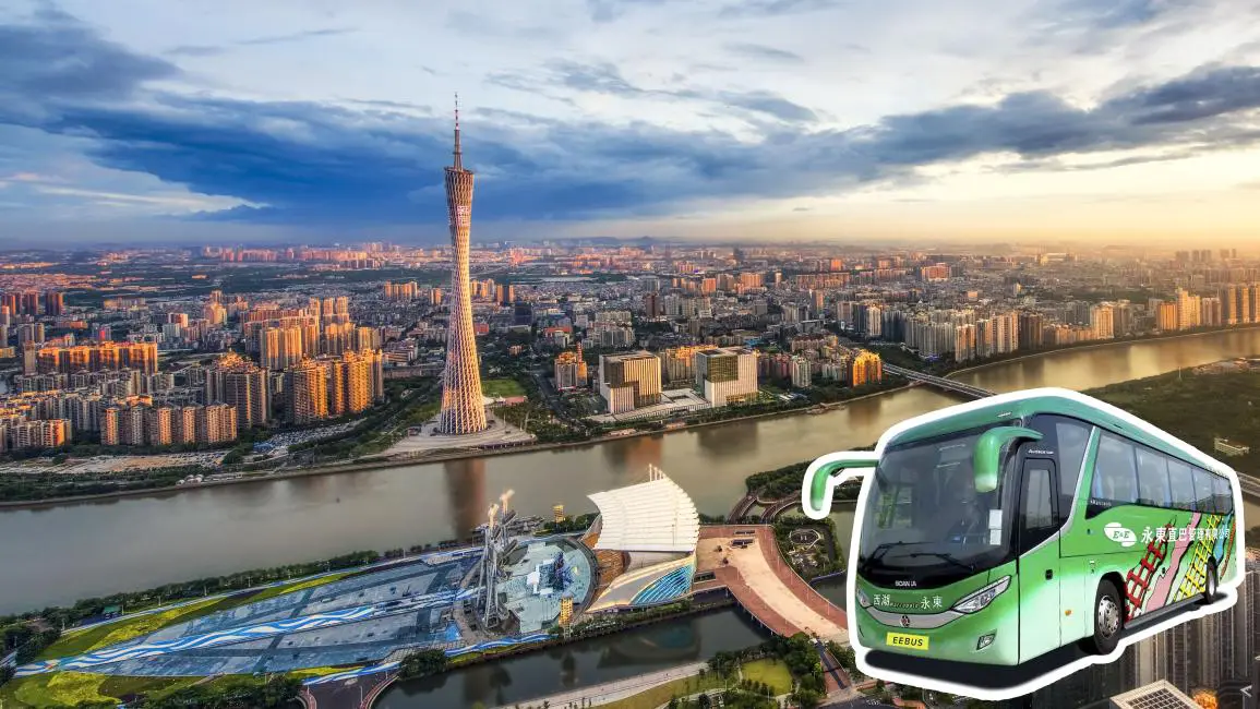  a picture of Guangzhou city and tower with a shuttle bus sticker on it