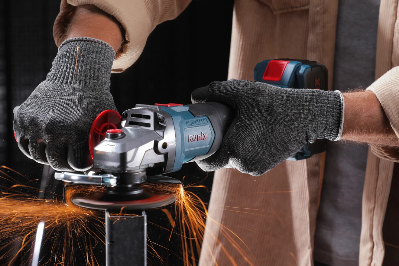 Ronix 8901 brushless cordless angle grinder being used on metal and creating sparks.