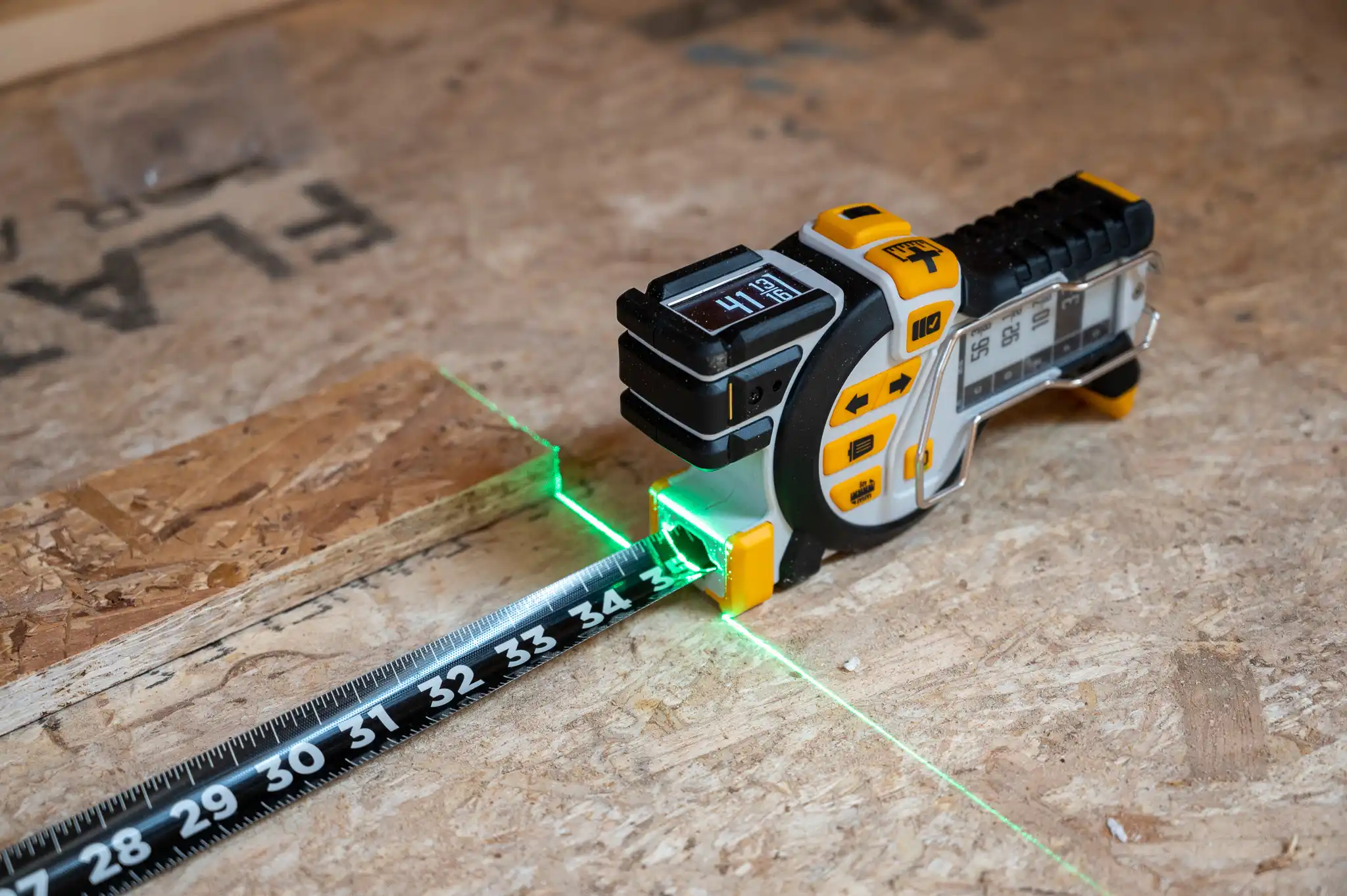 The REEKON T1 Tomahawk Digital Tape Measure in use