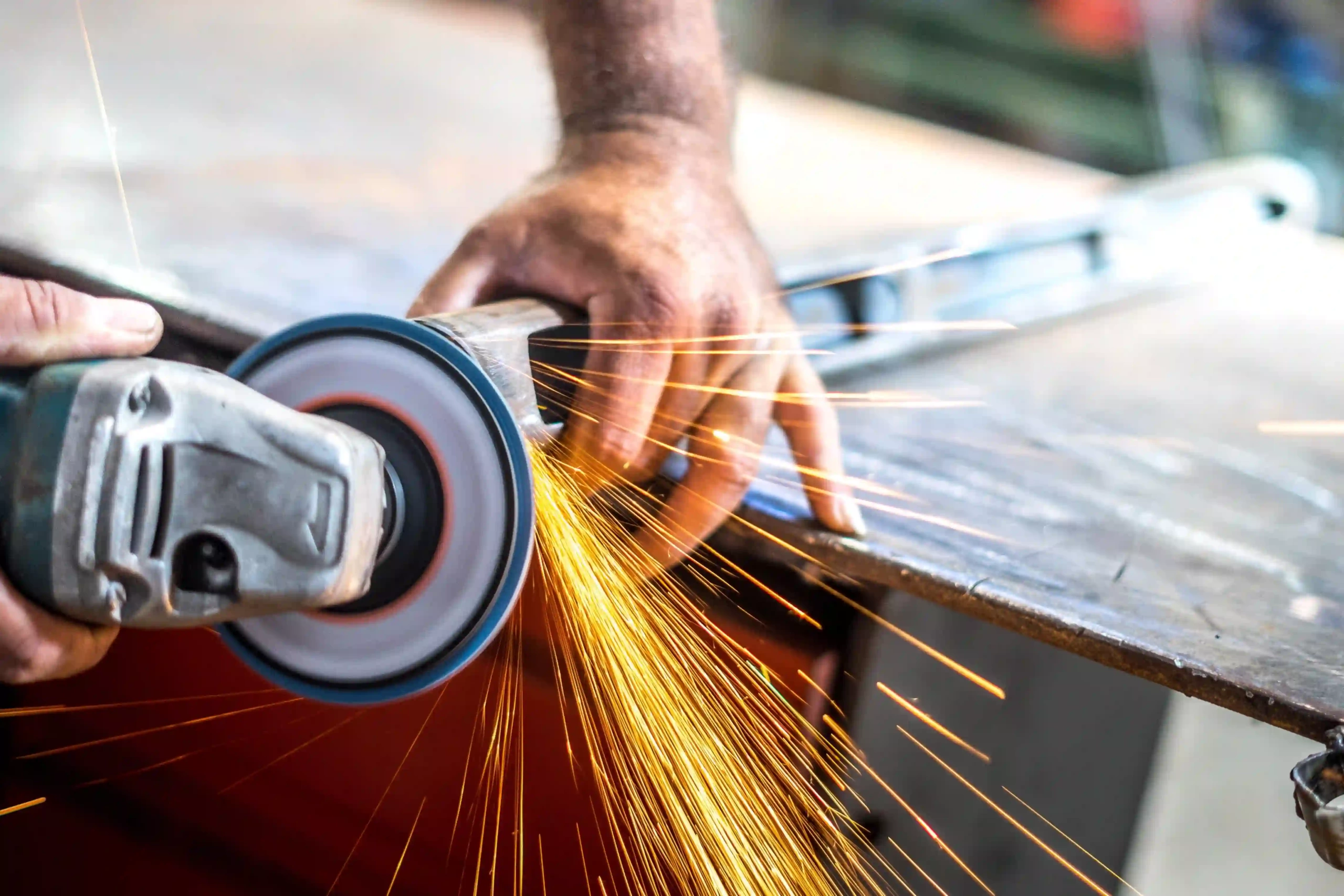 Close-up of grinding metal with a rotary tool.