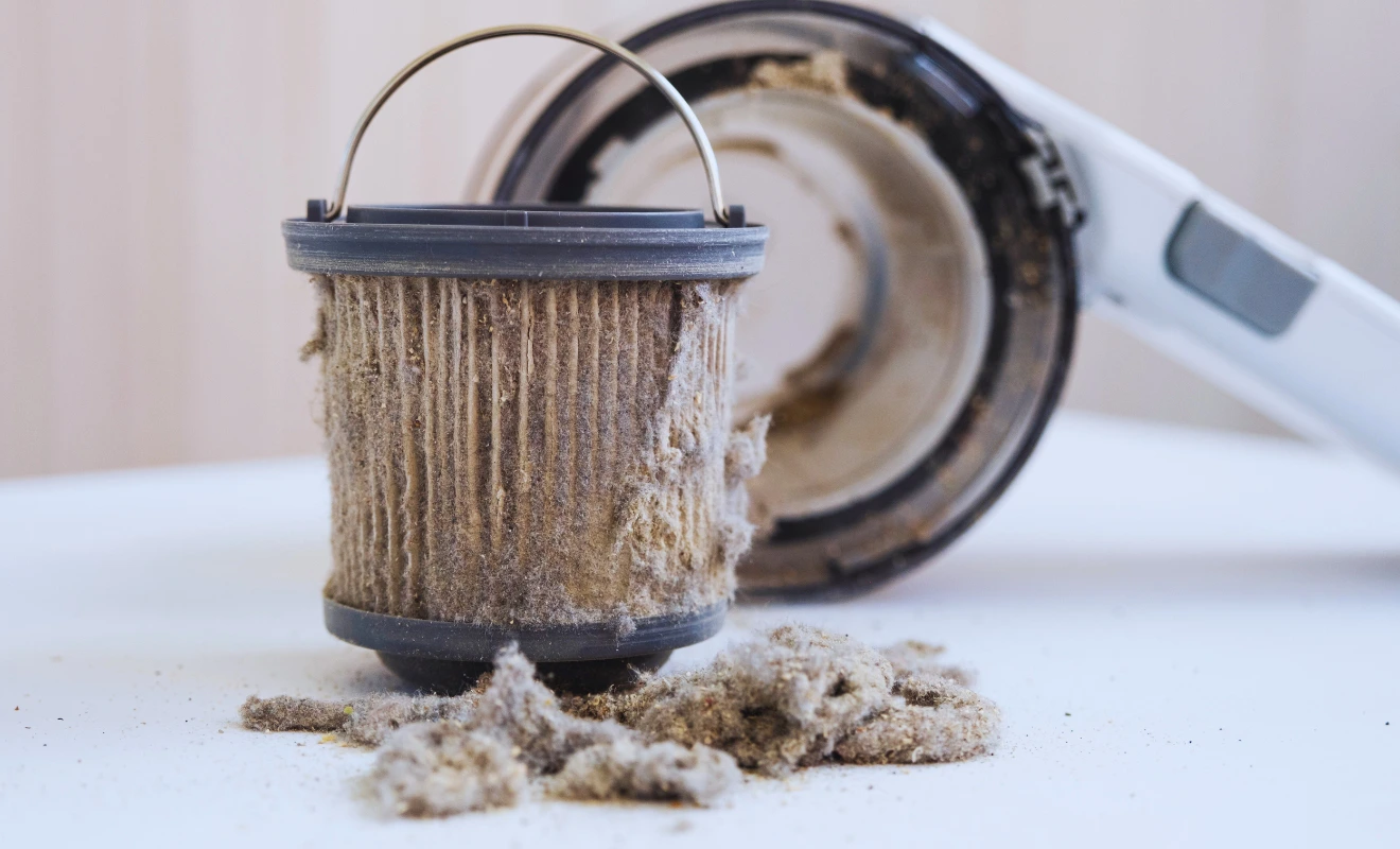 A photo of an industrial vacuum cleaners dirty filter