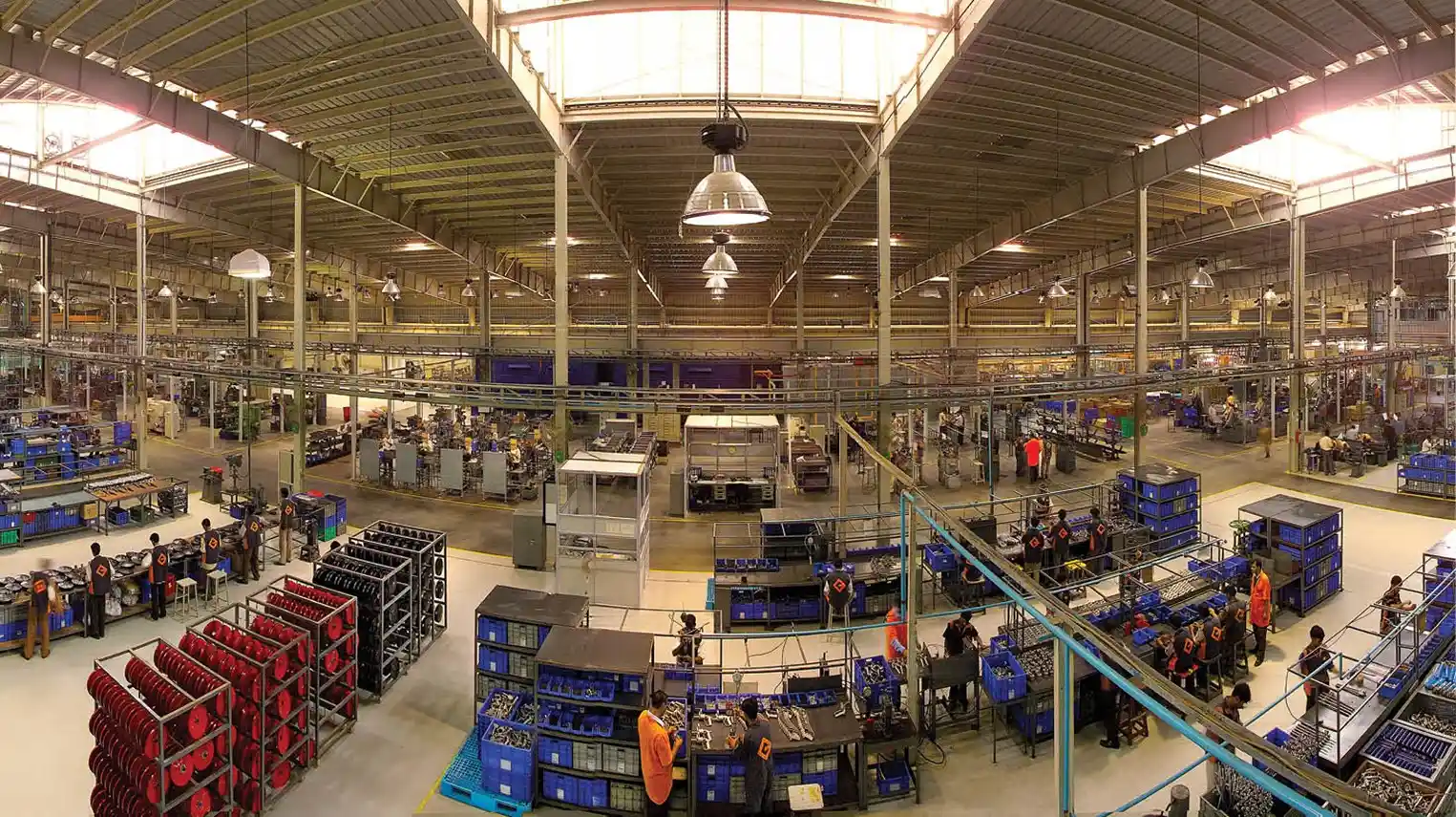 Groz factory floor with workers and machinery